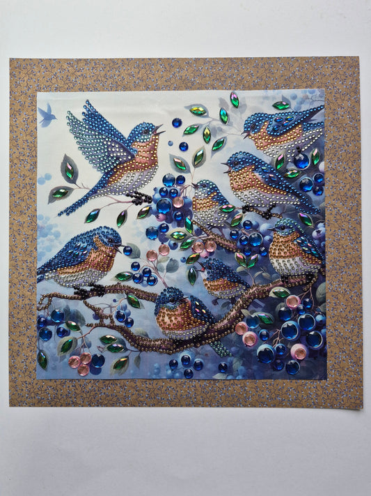 Blue Birds Sitting on Branches