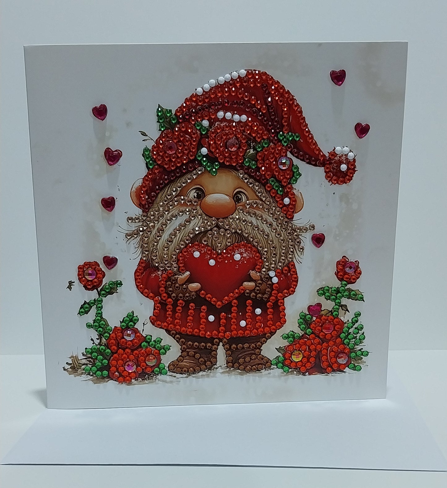 Red Hat Gnome holding a Red Heart Diamond Art Card